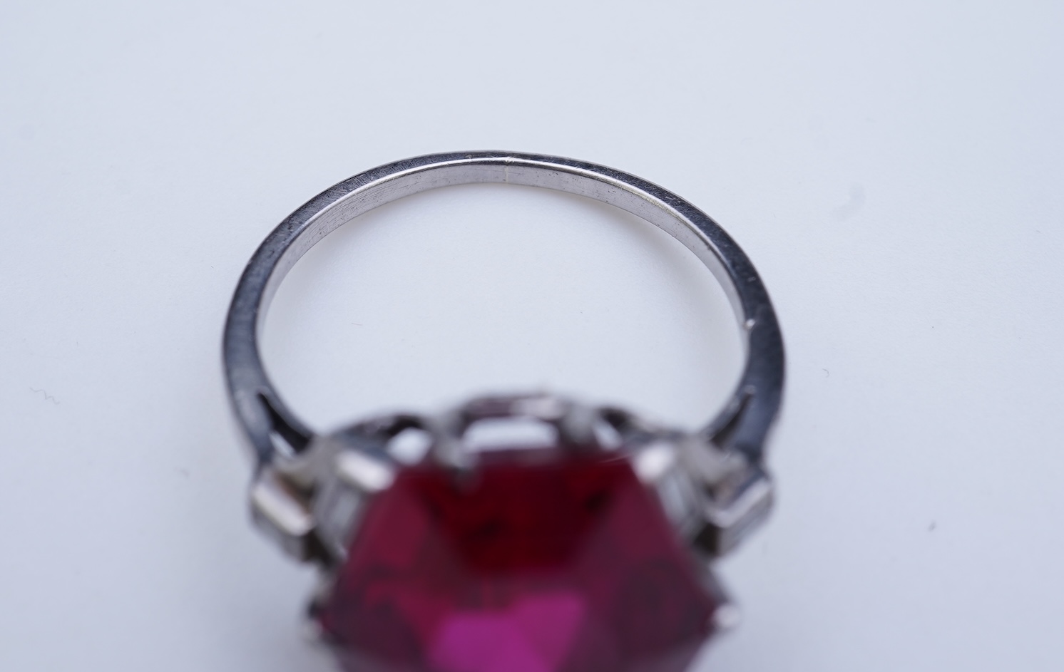 A synthetic ruby and diamond ring